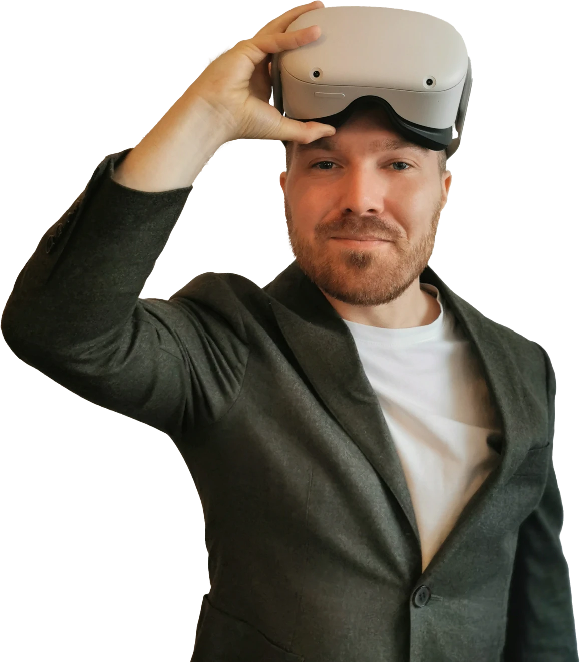 Gareth Walkom, founder of withVR, lifting a VR headset onto his forehead